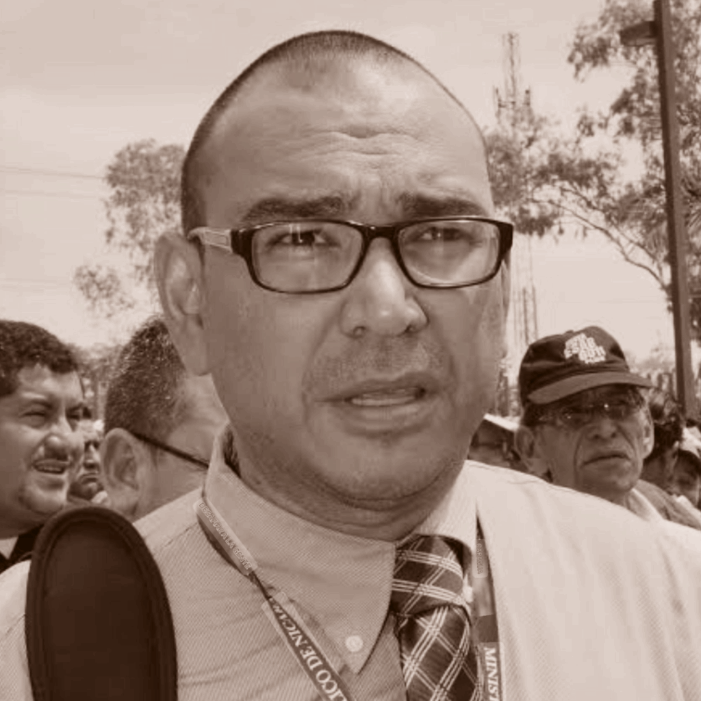 Giscard Moraga, conocido como el   «verdugo de periodistas», por sus interrogatorios violentos y abusivos en contra de hombres y mujeres de prensa.|©Galería News